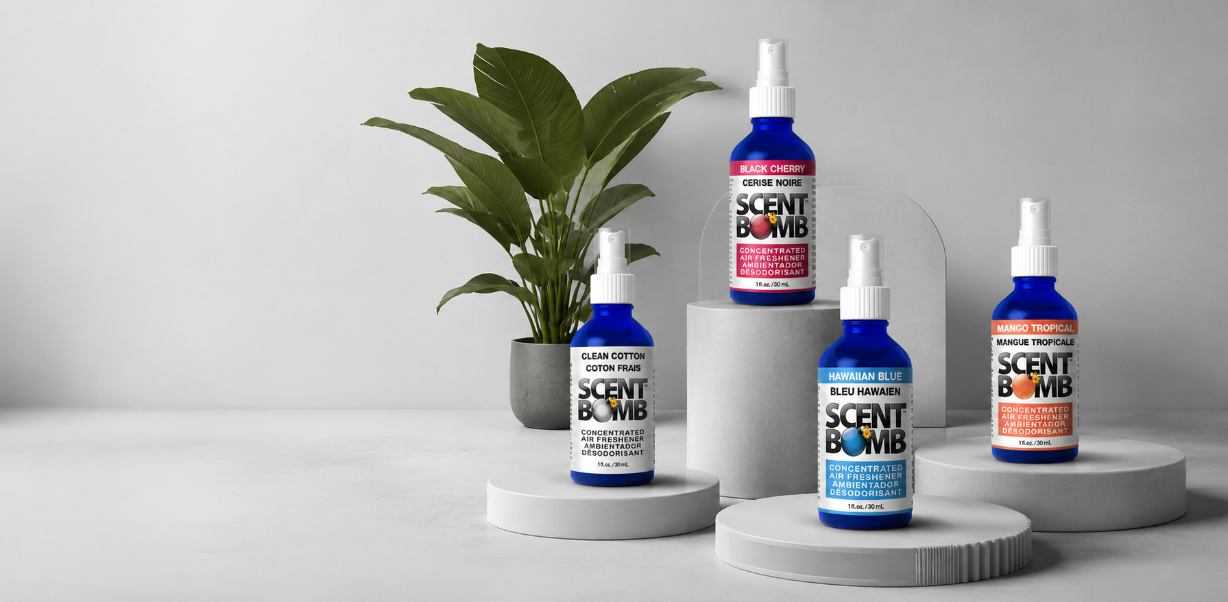 Scent Bomb concentrated air freshener spray lineup — 9 fragrances in 1 oz cobalt blue bottles, best sellers